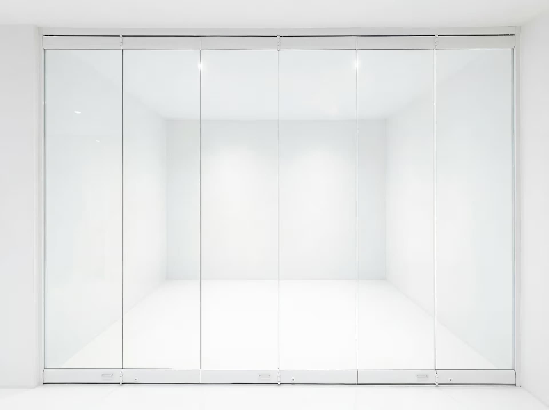 Glass folding door installed in a modern cafe interior showing transparency and openness